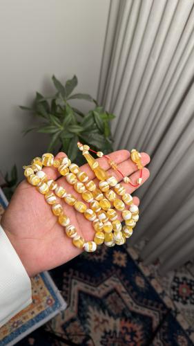 A black olivine prayer bead string