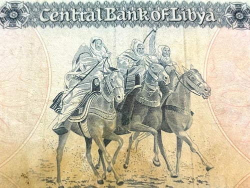 عملة ليبيا تحمل صورة عمر المختار حجم العملة كبير