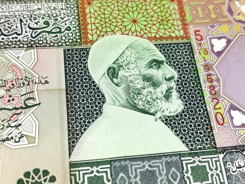 عملة ليبيا تحمل صورة عمر المختار - عليها آية قرآني...