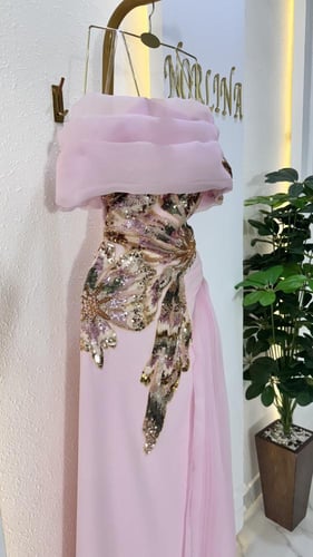 فستان زهري بكلفه براقه وكسرات اورجنزا