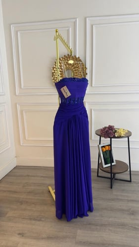 فستان بلون موف يلفت الأنظار بشك يدوي