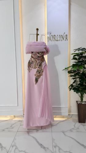 فستان زهري بكلفه براقه وكسرات اورجنزا