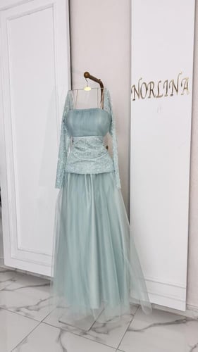 فستان بلون تيفاني بترتر خصر مميزه