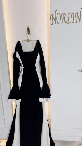 فستان اسود مع تدخيله سكري جوانب