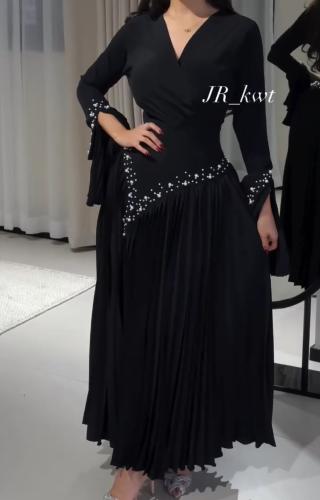 فستان اسود بتكسيره بليسيه