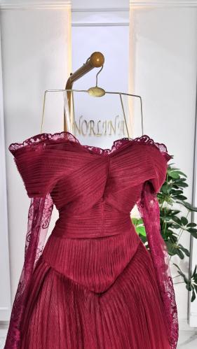 فستان بلون عودي تصميم ملكي