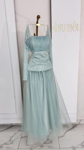 فستان بلون تيفاني بترتر خصر مميزه