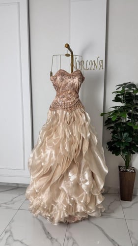 فستان زهري مطرز بترتر وخرز