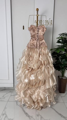 فستان زهري مطرز بترتر وخرز