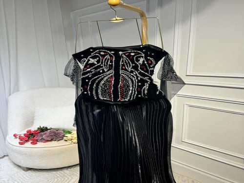 فستان بالجوخ وكسرات الجازار