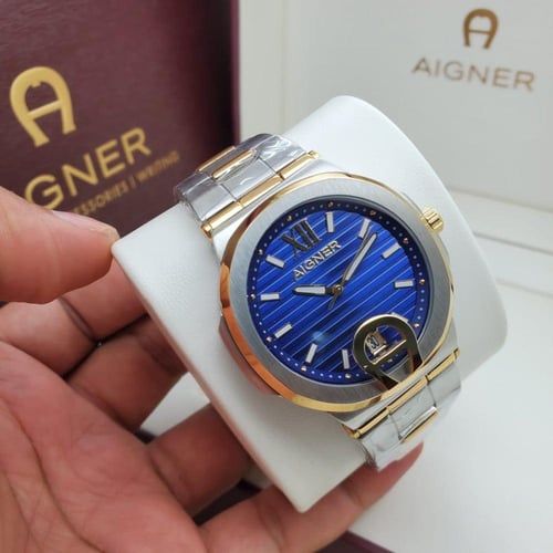 ساعة اقنر رجالية فضي ذهبي ميناء ازرق