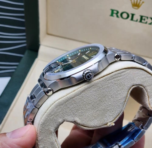 ساعة اقنر رجالي فضي ميناء اخضر