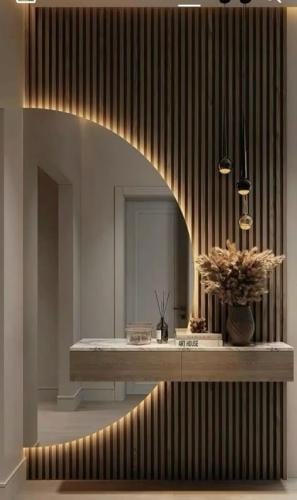 مدخل مودرن أنيق بأستخدام بديل الخشب مع مرايا نصف د...