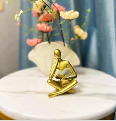 تمثال تجريدي مميز بشكله الأنيق لمحبي القراءة و أصح...