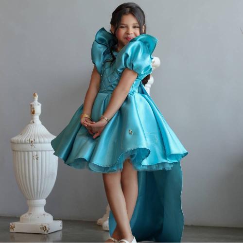 Elegant navy dress decorated with crystals on the...