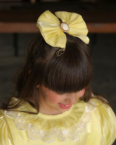 Yellow baby bow