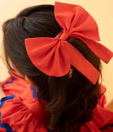 Orange bow with the logo