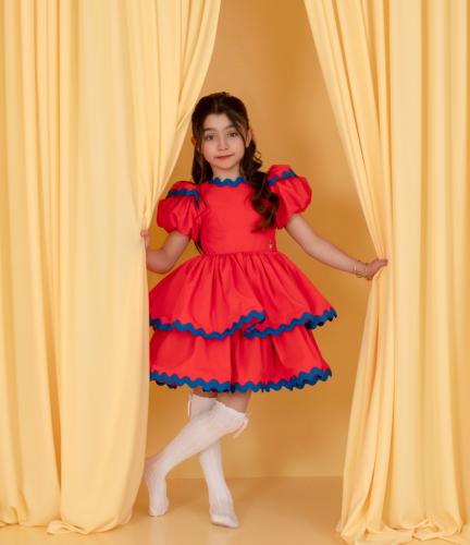 A dress in a distinctive color with blue glass