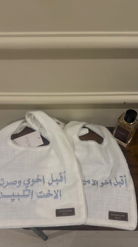 وشاح استقبال مولود ابيض قيطان فضي