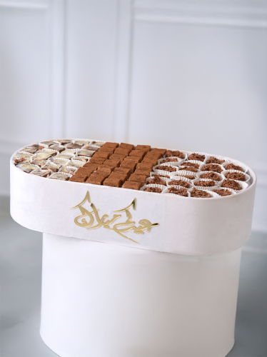 اناء فاخر يحتوي على: كرانشي شكولاتة، رنجينة كويتية...