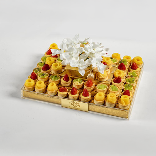 تبسي مزين بالورد ؛ 54 قطعة تارت الفواكه