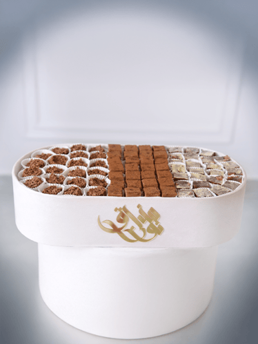 اناء فاخر يحتوي على: كرانشي شكولاتة، رنجينة كويتية...