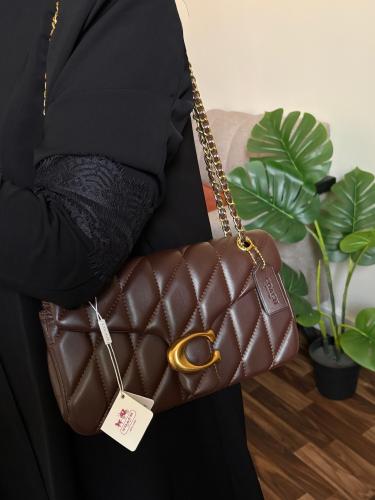 حقيبة كوتش تابي بني غامق