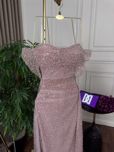 فستان ملكه سهره وردي فخم