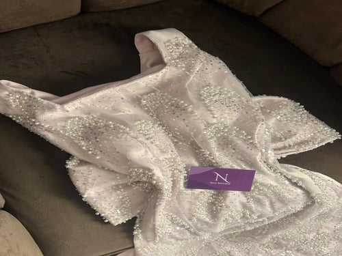 فستان رهاف الوردي