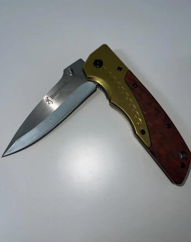 سكين مذهب قابل لطي