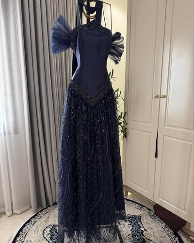 فستان سهره لون انيق راقي خامه ميكادو +تل +تطريز يد...