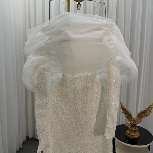 فستان سهره راقي مرصع بالكرستل مع ذيل انيق شيفون