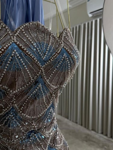 فستان سهرة لون انيق خامه خرز عل تل مبطن