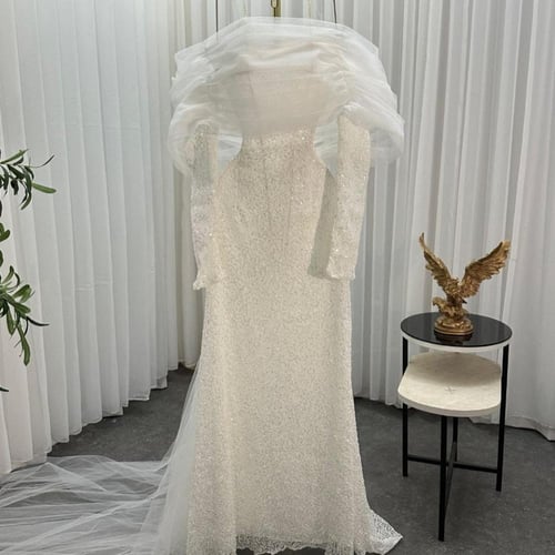 فستان سهره راقي مرصع بالكرستل مع ذيل انيق شيفون