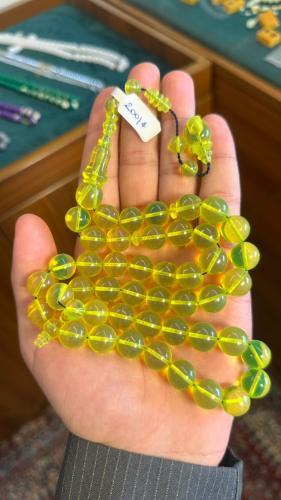 A bracelet with transparent green acrylic