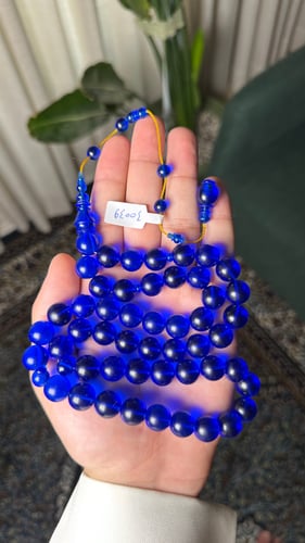 Blue cast prayer bead