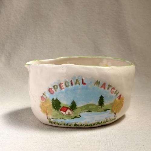 A cup with the phrase: (The sweetest graduate)