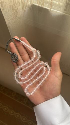 A prayer bead bracelet with turquoise ceramic, 925 silver, transparent color (changes color with the sun to lavender).