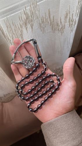 A prayer bead bracelet with turban-style clasp, si...