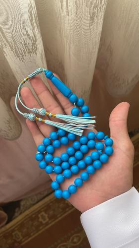 A light sky blue prayer bead string with Kuwaiti K...