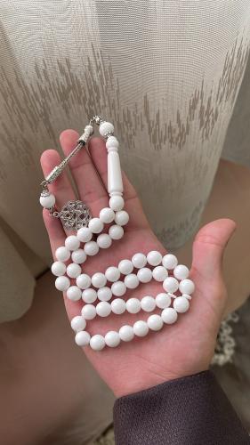 White color plastic prayer bead string with metal...