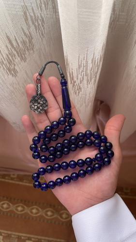 A prayer bead bracelet with turquoise and silver,...