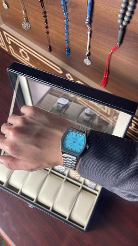 Casio Classic watch, silver color, sky blue dial