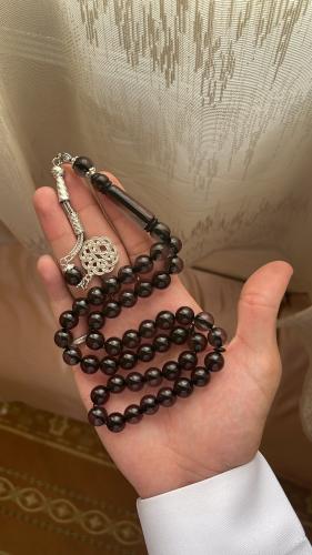 Black transparent plastic prayer bead string with...