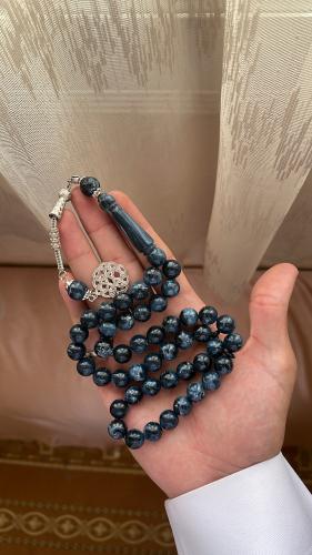 A blue mixed color prayer bead with turquoise and...