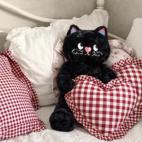 Black cat plushie
