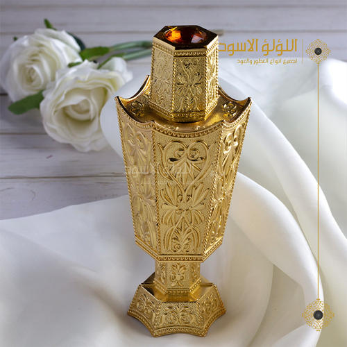 زجاجه عطر ذهبي فارغه