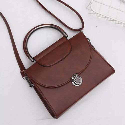 حقيبة يد وكتف من الجلد ، راقيه وجذابة .