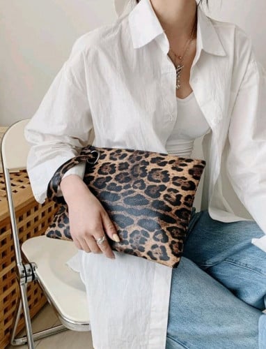 حقيبة يد جلد الفهد انيقة وناعمة ،