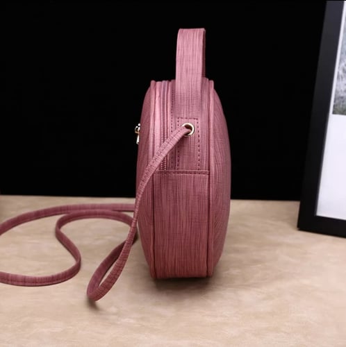 حقيبة يد وكتف بتصميم دائري أنيق وسعة جميلة